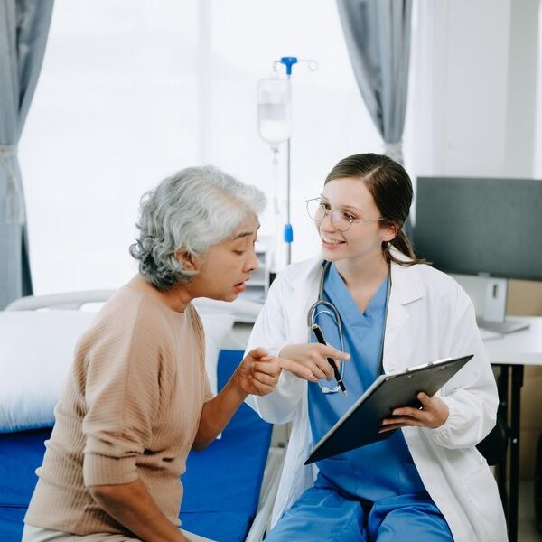 friendly-female-head-nurse-making-ro